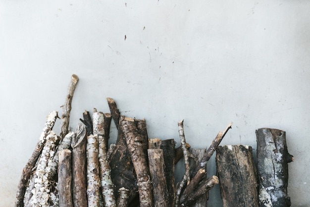 Wooden log lean on white background  in the Akha village of Maejantai on the hill in Chiangmai, Thailand.