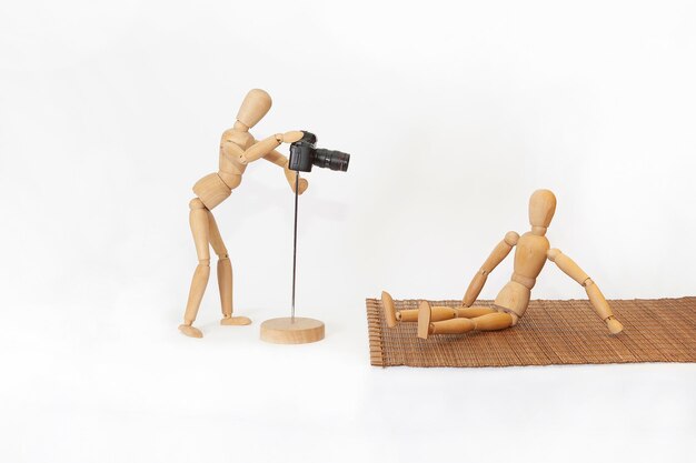 Wooden mannequin on white background