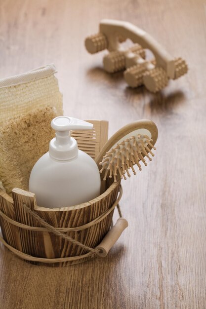 Wooden massager and bucket