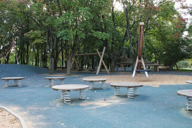 Photo wooden modern ecological safety children outdoor playground equipment in public park nature archite