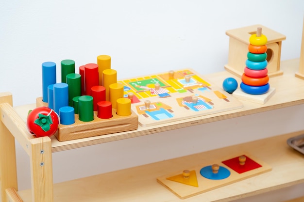 Wooden montessori shelf with learning materials