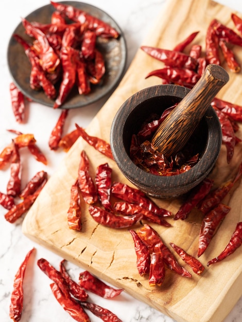 Wooden mortar and Vietnamese hot pepper