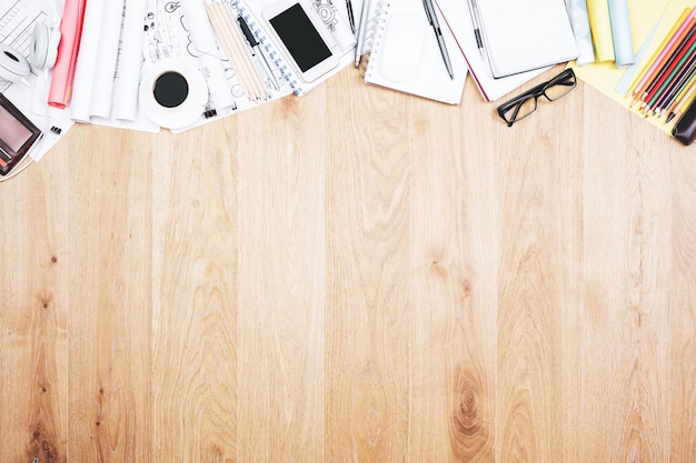 Wooden office table top with items