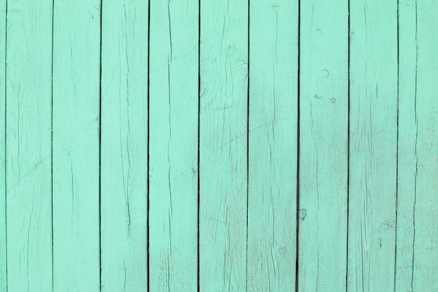 Wooden old shabby colored wall in full screen Photographed at close range