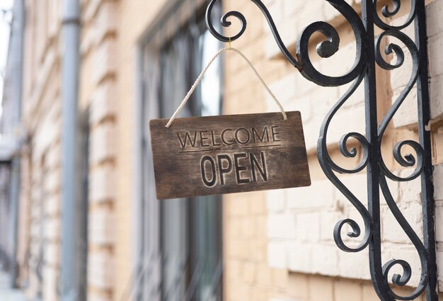 Photo wooden open sign hanging