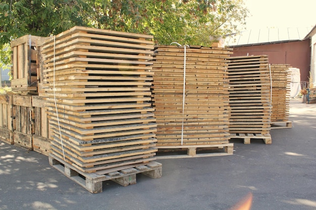 Photo wooden pallets for transportation of goods in the warehouse packaging of finished products of the p