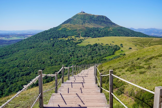 Wooden pathway long staircase for access on hight mountain Puy de DÃÂÃÂÃÂÃÂ´me volcano in Auvergne france