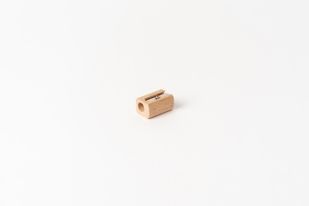 Wooden pencil sharpener on white background