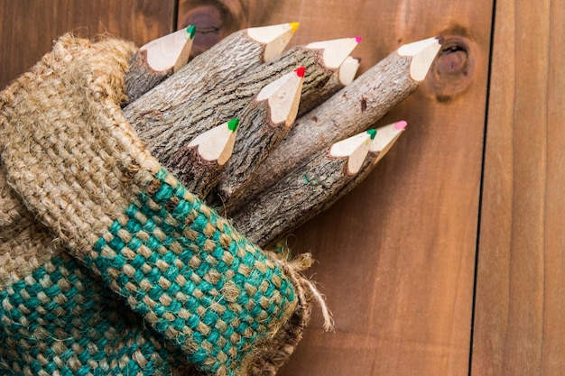 Wooden pensil colour on the brown background