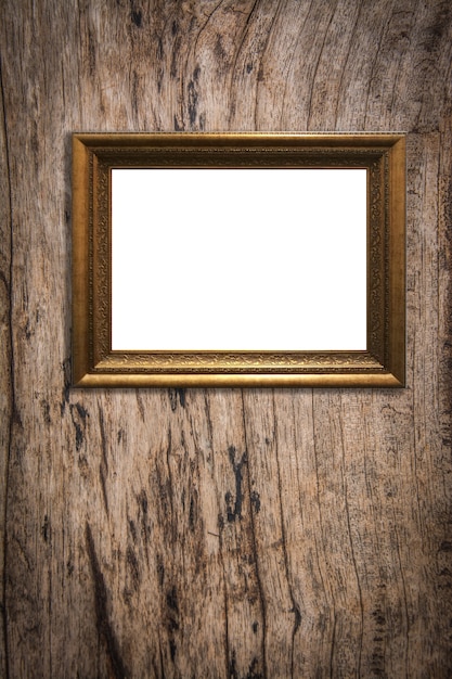 wooden picture frame on old wood background