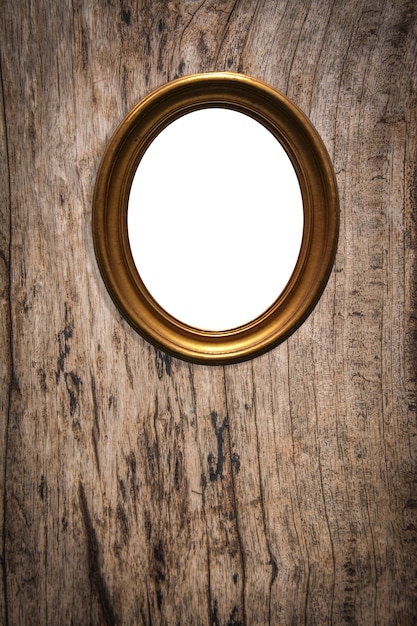 wooden picture frame on old wood background