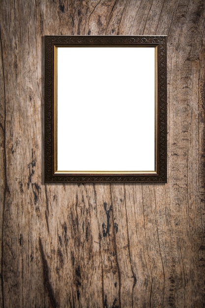 wooden picture frame on old wood background