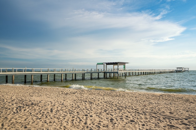 Wooden pier between sunset in Phuket, Thailand. Summer, Travel, Vacation and Holiday concept.