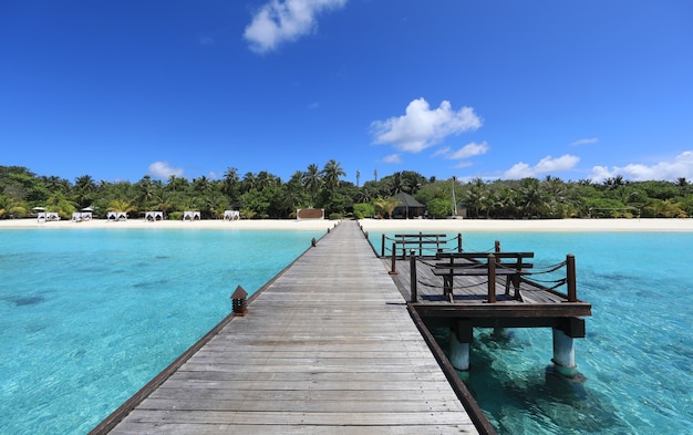 wooden pier on a tropical island Maldives