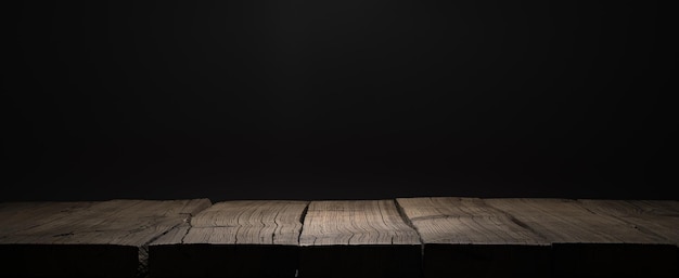 Wooden plank podium or table in the dark