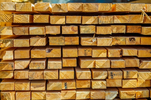 Wooden planks. Beams. Air-drying timber stack. 