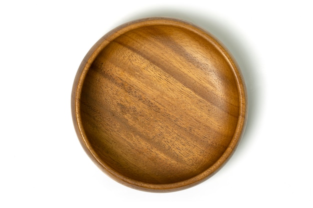 Wooden plate on white background