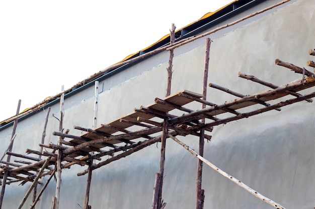 Wooden platforms with concrete wall