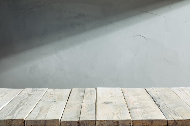 Wooden podium in front of a concrete wall