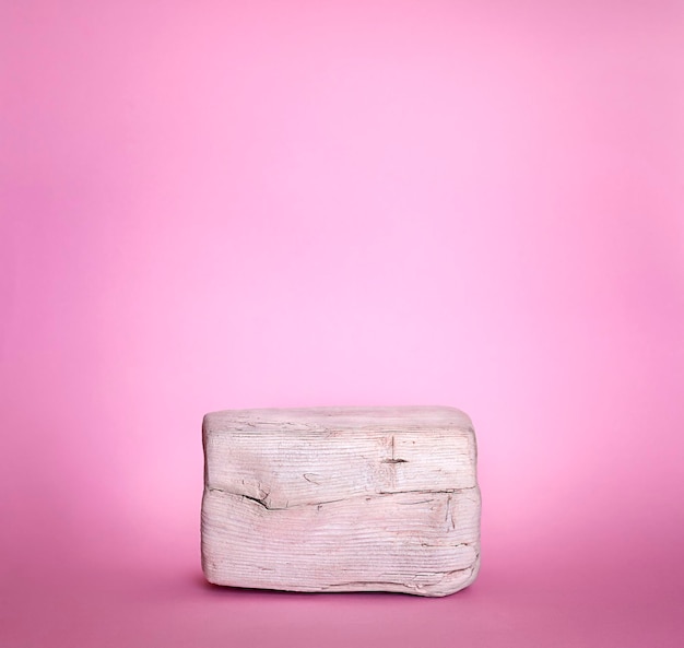 Wooden podium on a pink background Minimalism style