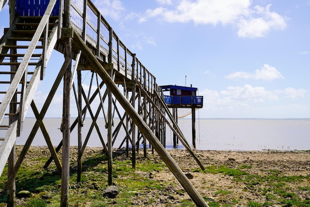 Wooden pontoon fishing hut at sea coast SaintPalaissurMer