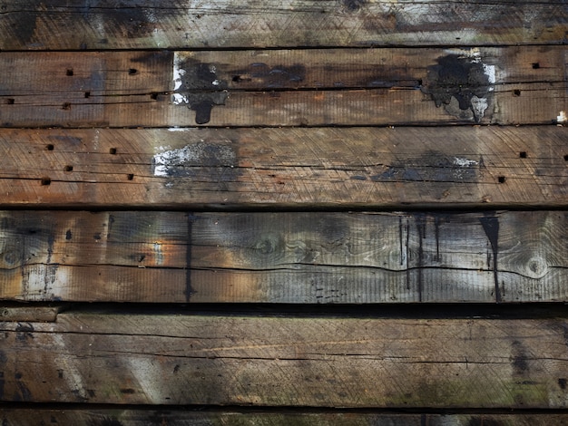 Photo wooden railway sleepers. stacked on top of each other