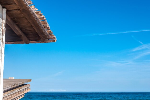 Wooden and reed roof on the beach