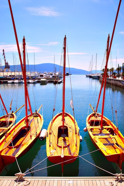 Wooden sail boats on the berth