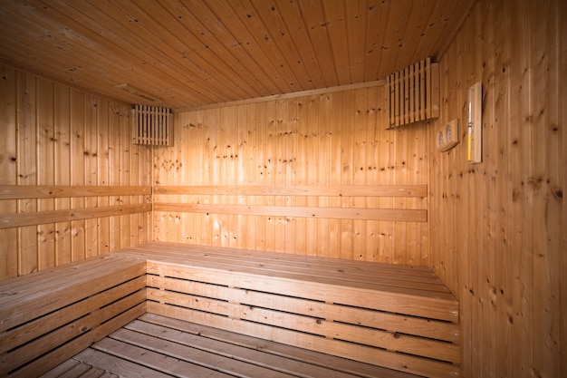 Photo wooden sauna interior  room, relax in a hot sauna