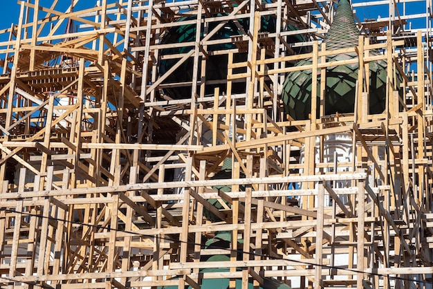 Wooden scaffolding on the reconstruction of the temple