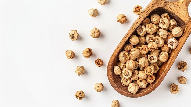 Photo wooden scoop containing dried organic gokhuru tribulus terrestris fruits with top view and a big space for text or product generative ai