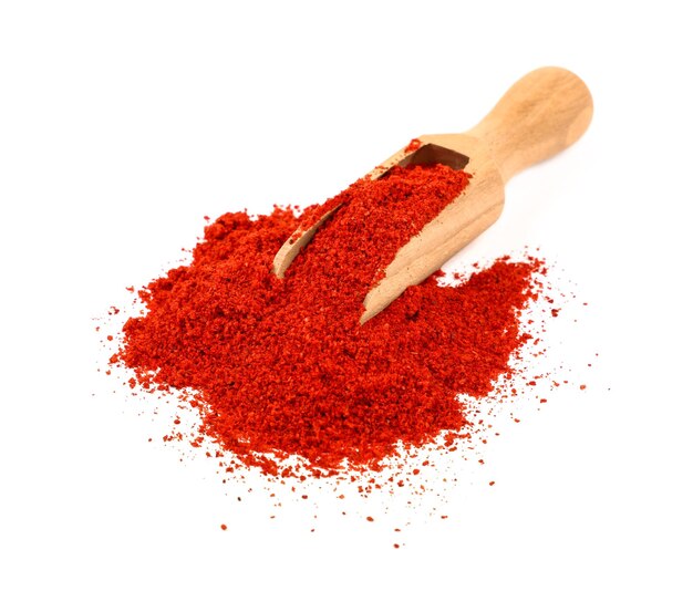 Wooden scoop full of red hot chili pepper