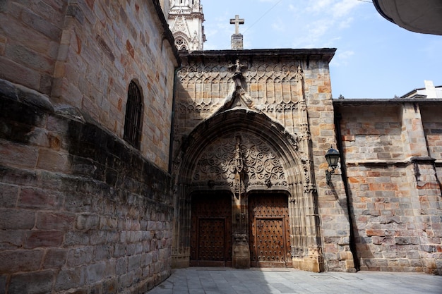 The wooden side door of the Cathedral of Santiago in Bilbao