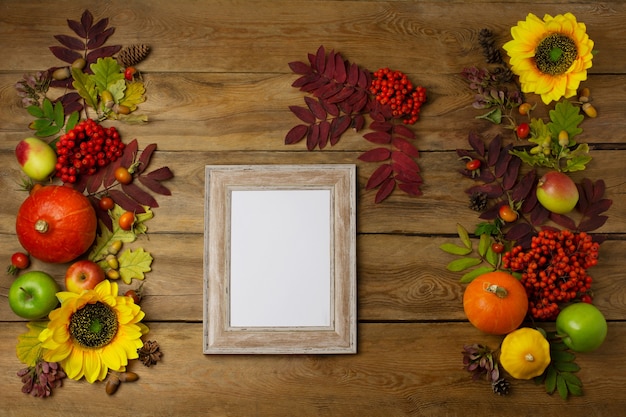Wooden small frame mockup with sunflowers pumpkins and fall leaves Empty frame rustic mock up