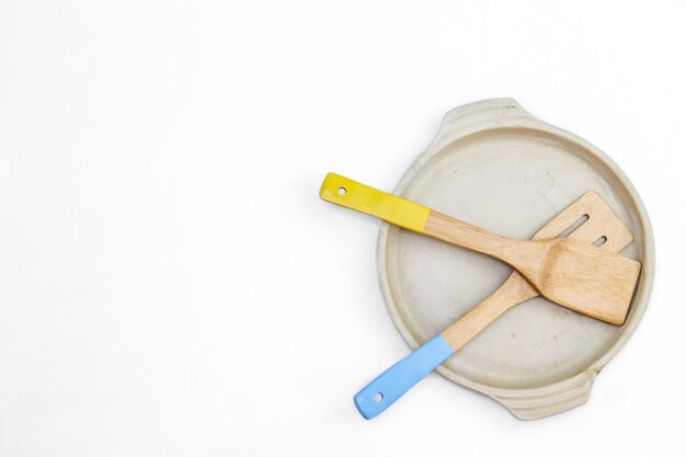 Photo wooden spatula isloated pan cooking