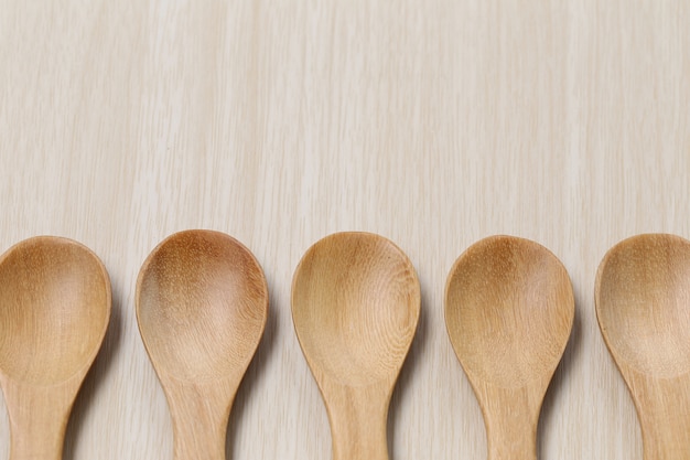 Wooden spoon on brown wood floors