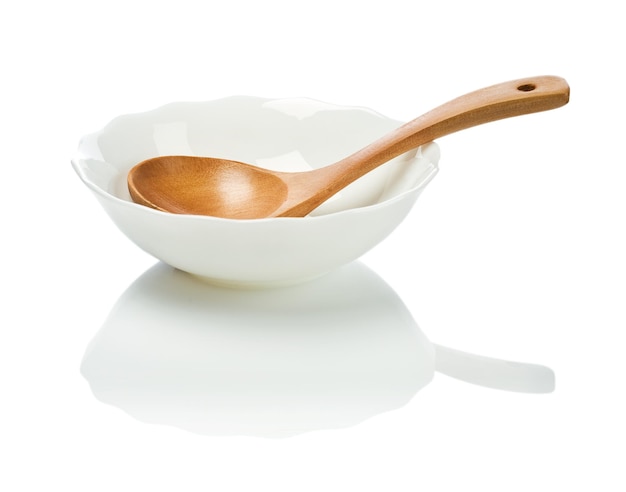 Wooden spoon in empty dish