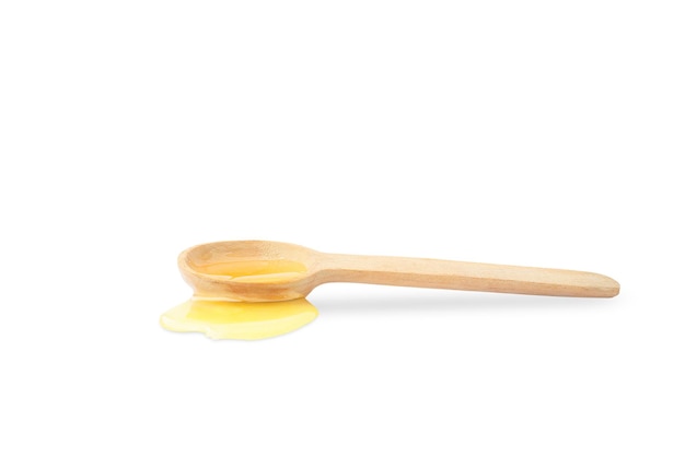 Wooden spoon in a horizontal position on a white background