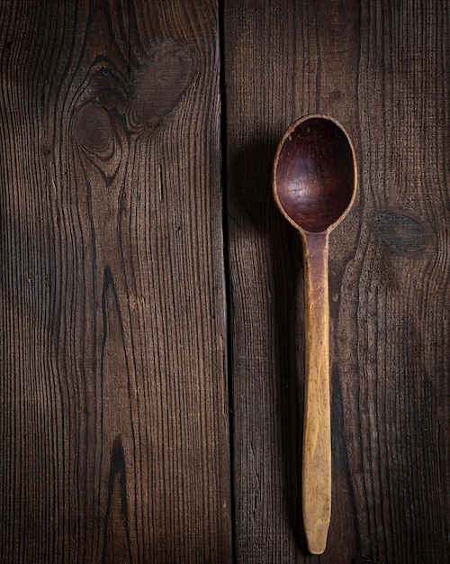 Photo wooden spoon on table