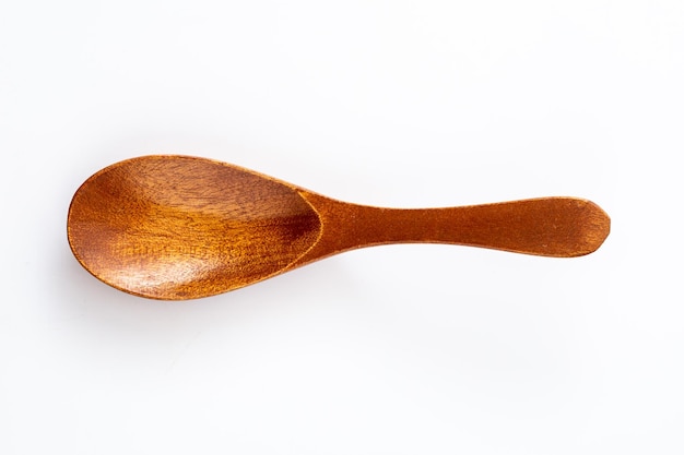 wooden spoon on white background