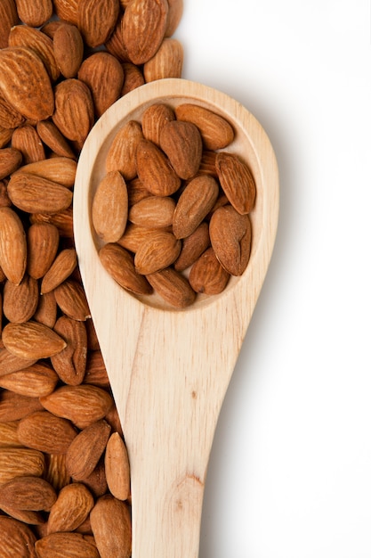 Wooden spoon with almonds