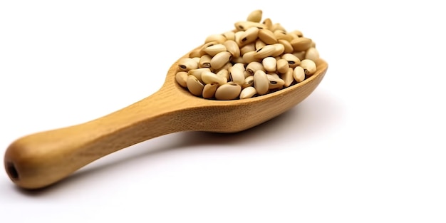 a wooden spoon with peanuts on it and a wooden spoon