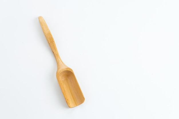 Wooden spoons isolated on white background Copy space