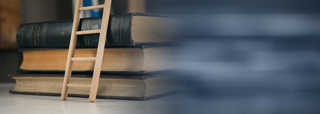 Wooden stair with stack of books