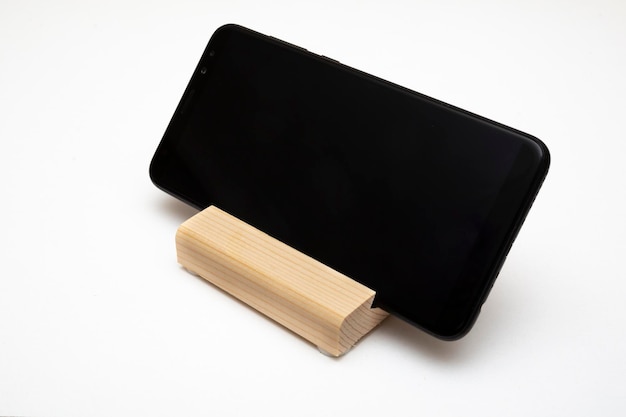 Wooden stand for smartphone