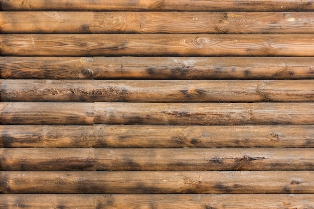 Wooden striped texture, a brown background.