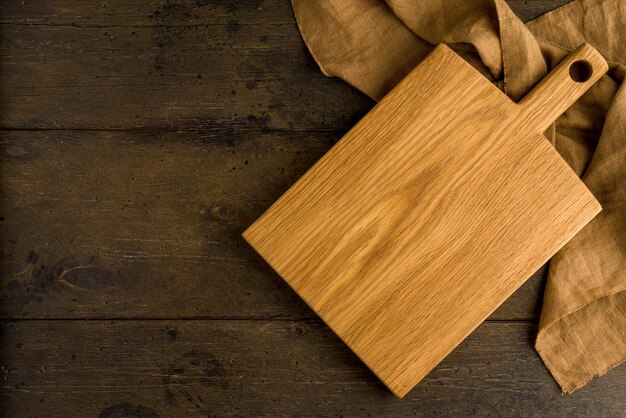 Wooden sturdy surface to prep on lightweight wood cutting board above copy space