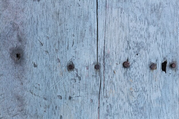 wooden surface with nails