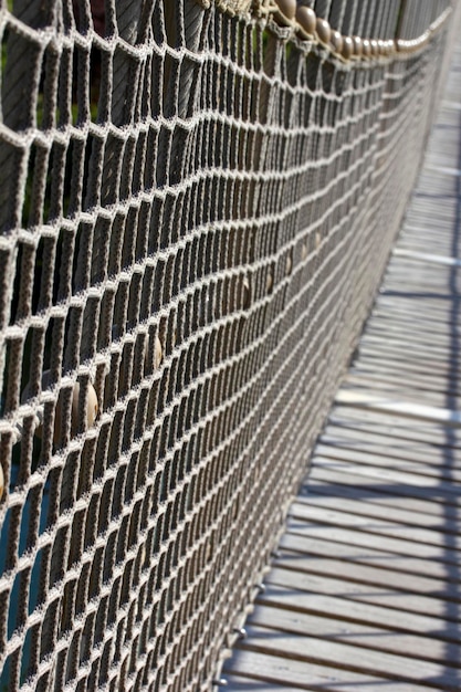 Wooden suspension bridge in public park