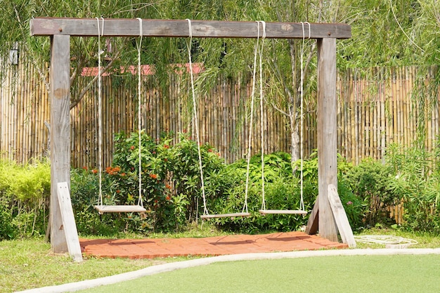 Wooden swings in the playground